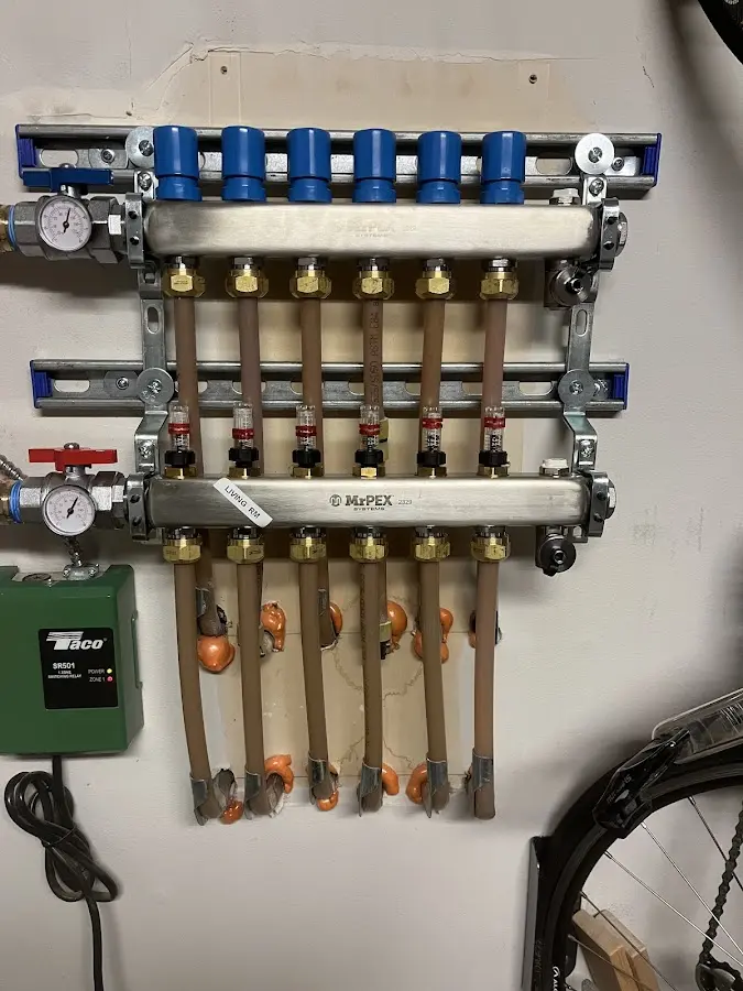 Plumber performing Water Heater Repair at a residential property in Pittston